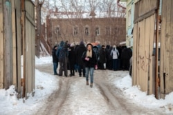 Жители памятников деревянного зодчества в центре Томска