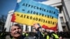 UKRAINE – Activists attend a rally to demand lawmakers vote for a law that grants special status to the Ukrainian language and introduces mandatory language requirements for public sector workers, in front of the parliament building. Kyiv, April 25, 2019